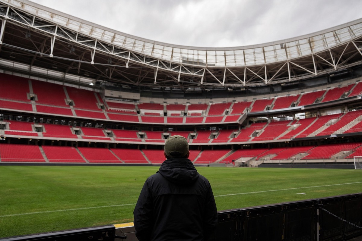 Pitchside view of the stands inside Anfield stadium